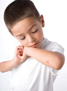 Picture of a boy who has injured his elbow