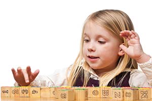 Girl Counting Blocks