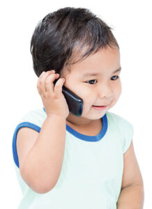 toddler with toy phone