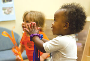 Toddler clapping hands