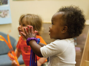 Toddler clapping hands