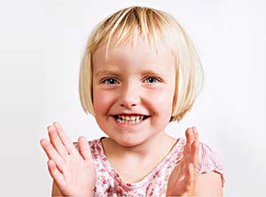 child clapping