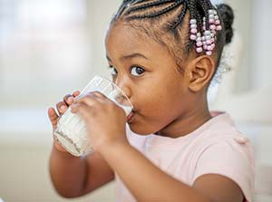 Picture of Brianna drinking milk