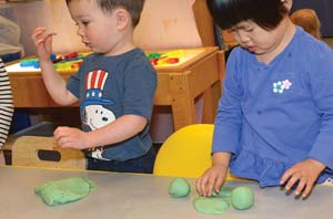 children playing with play dough