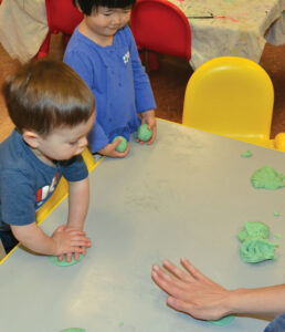 children with play dough