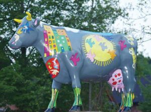 Painted cow sculpture