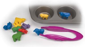 Animal counters in a muffin tin